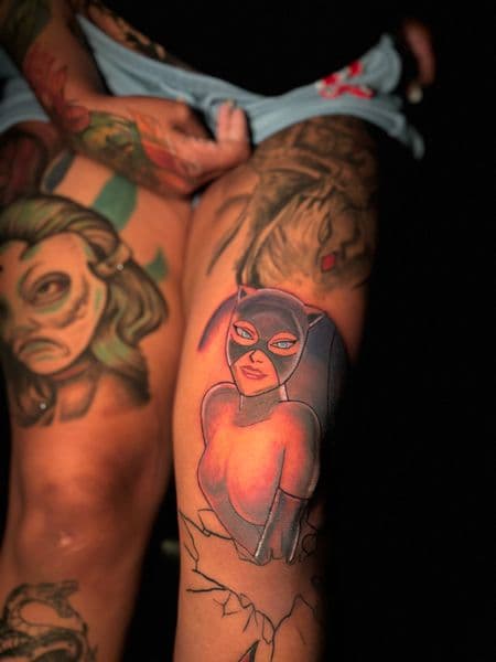 Anime + Color catwoman tattoo on Thigh by Duke on TattMe