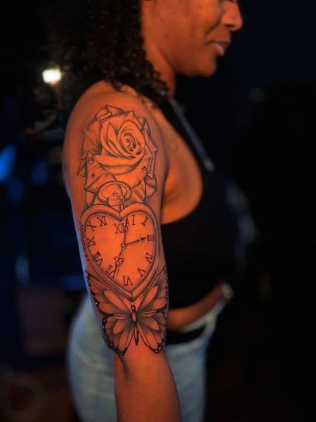 Black & Grey + Illustrative rose tattoo on Upper Arm by Duke on TattMe