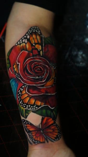 Color + Illustrative rose tattoo on Forearm by ratedr.ink on TattMe