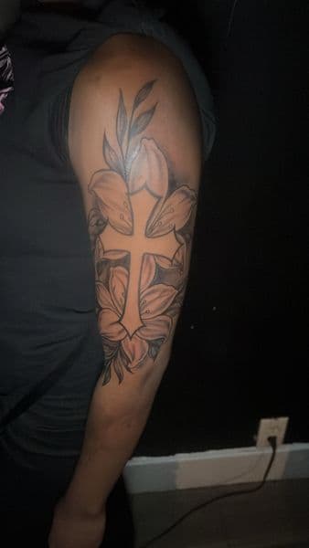Black & Grey + Floral cross tattoo on Upper Arm by veelutatts on TattMe