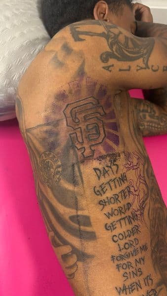 Black & Grey + Lettering sports logo tattoo on Side (Torso) by Slimxink on TattMe