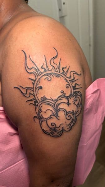 Illustrative + Black-work sun tattoo on Shoulder by Slimxink on TattMe