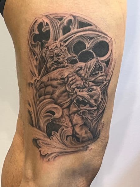 Black & Grey + Realism gargoyles tattoo on Thigh by Moving_Murals on TattMe