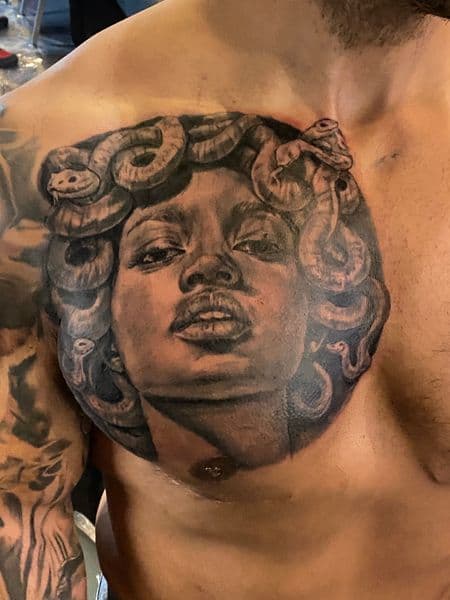 Realism + Black & Grey medusa tattoo on Chest by Moving_Murals on TattMe