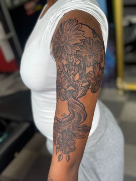 Black & Grey + Floral tree tattoo on Upper Arm by Rell_MadeYouInk on TattMe