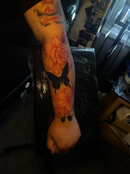 Floral + Color flowers tattoo on Forearm by Inkbymira on TattMe