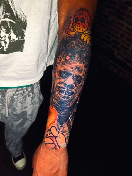 Realism + Color leatherface tattoo on Forearm by TattedMonkey_Tattoos on TattMe