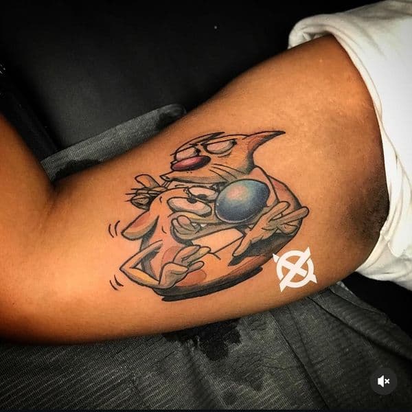 Cartoon + Color catdog tattoo on Upper Arm by DON_X_TATTOOS on TattMe