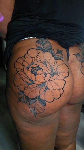 Floral + Illustrative peony tattoo on Buttocks by Mane_Creation_Studios on TattMe