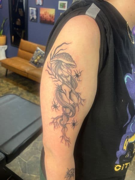 Black & Grey + Illustrative mushroom tattoo on Upper Arm by Spirit on TattMe