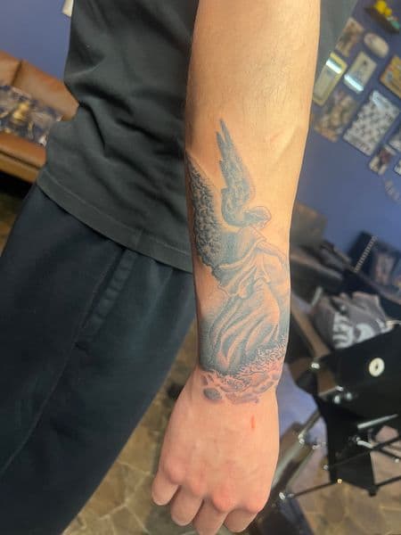 Black & Grey + Realism angel tattoo on Forearm by Spirit on TattMe